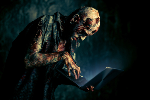 Zombie with laptop photo for Halloween entertainment post