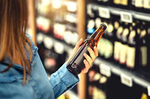 Woman browsing beer selection for inauguration day post