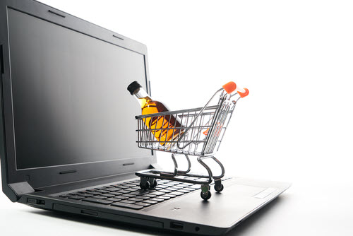 Laptop with liquor shopping cart photo for email best practices 2022 post